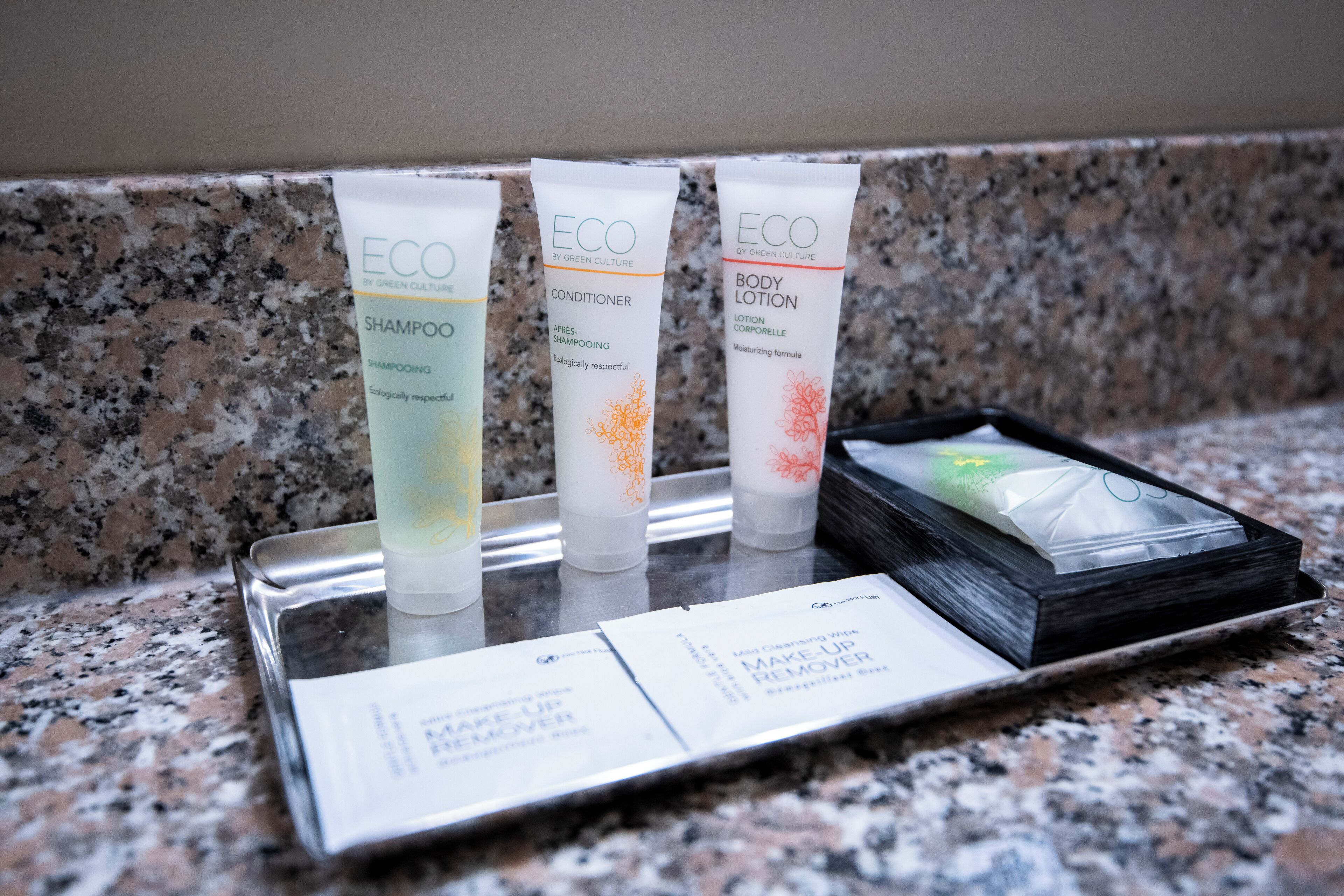 Three tubes of ECO body care products on a tray.