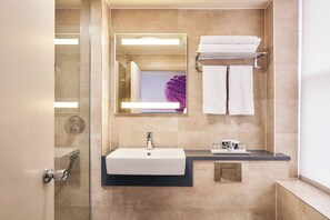Shower, eco-friendly toiletries, hair dryer, towels