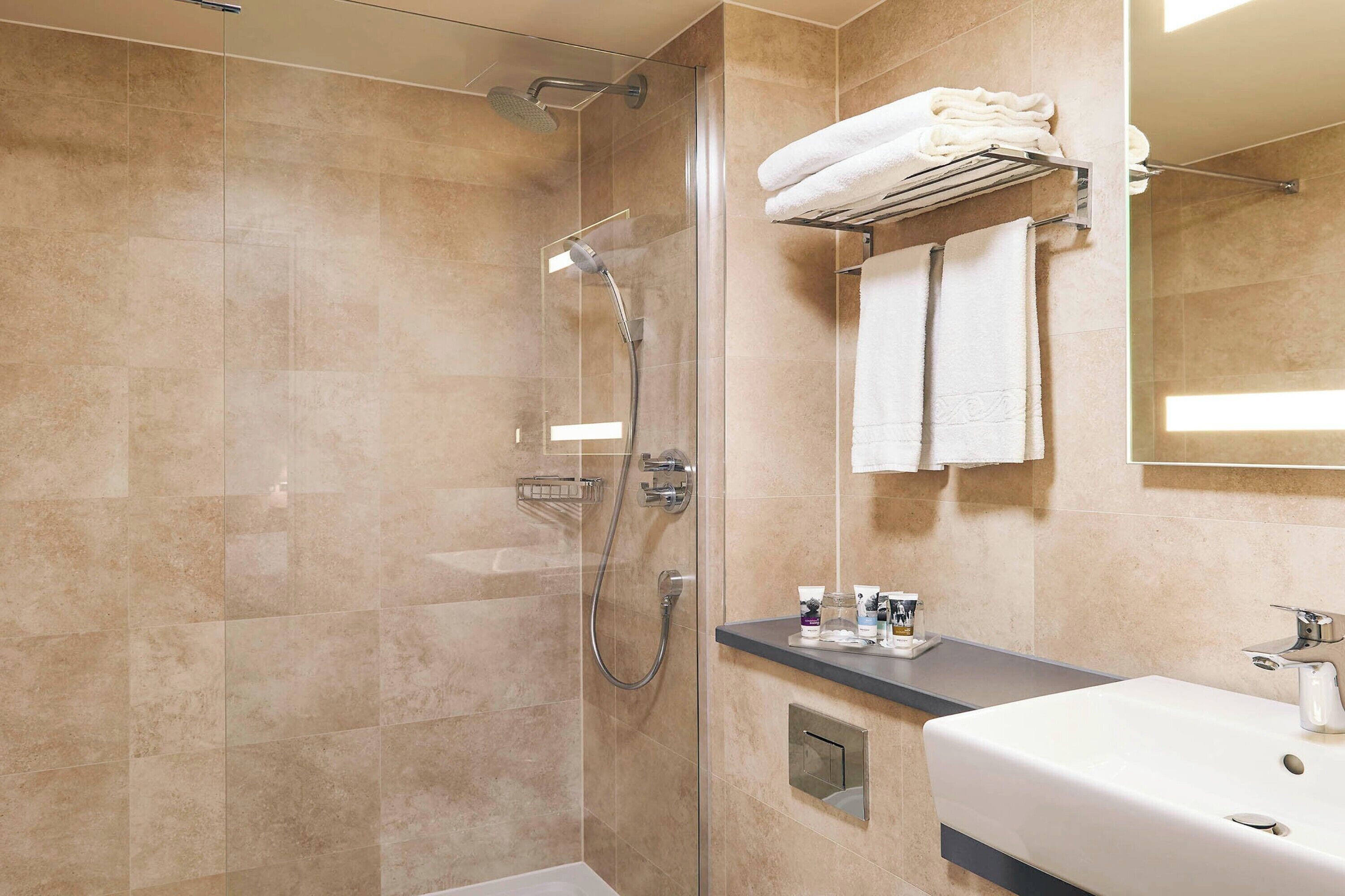 shower, eco-friendly toiletries, hair dryer, towels