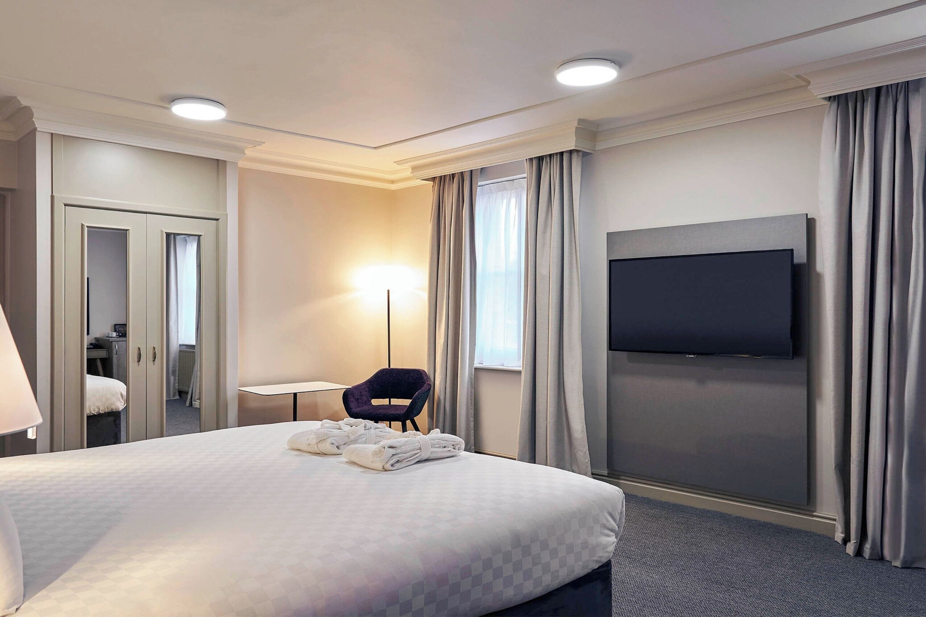 premier room, 1 king bed | in-room safe, desk, iron/ironing board, free wifi