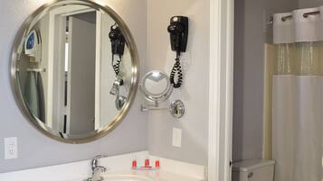 Bathtub, hair dryer, towels