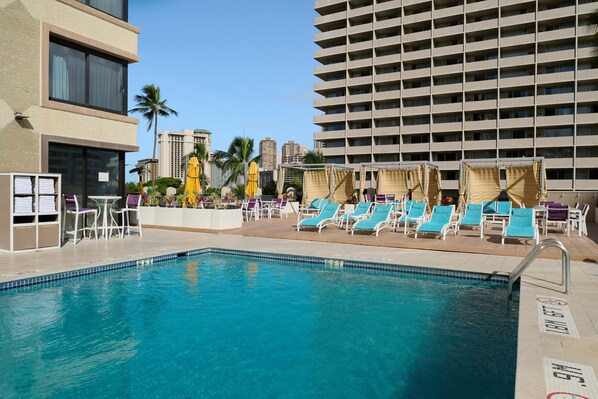Outdoor pool, open 8:00 AM to 10:00 PM, free cabanas, pool umbrellas