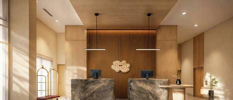 Un área de recepción con dos mostradores de mármol, un panel de pared de madera y un diseño de techo moderno.