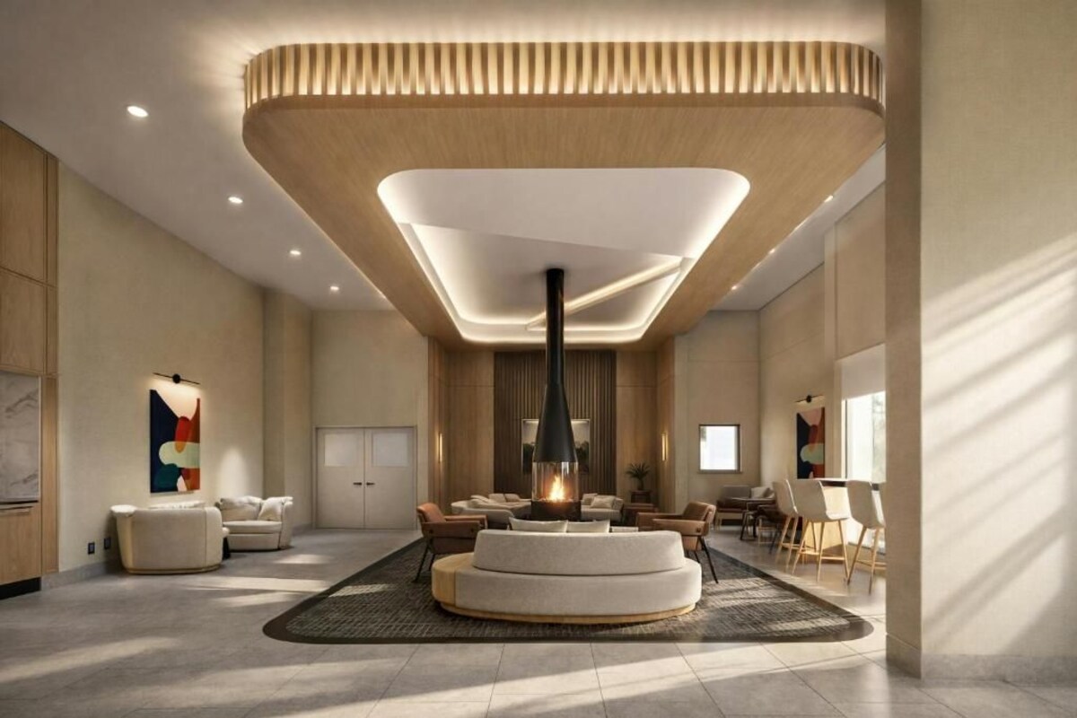Un intérieur moderne avec un espace salon central, un éclairage encastré et une cheminée.