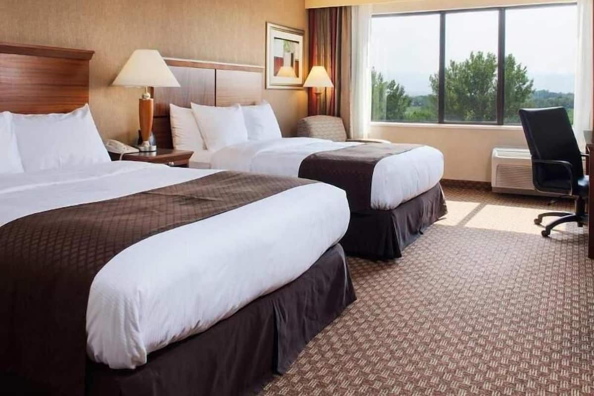 Hypo-allergenic bedding, down comforters, pillowtop beds, in-room safe