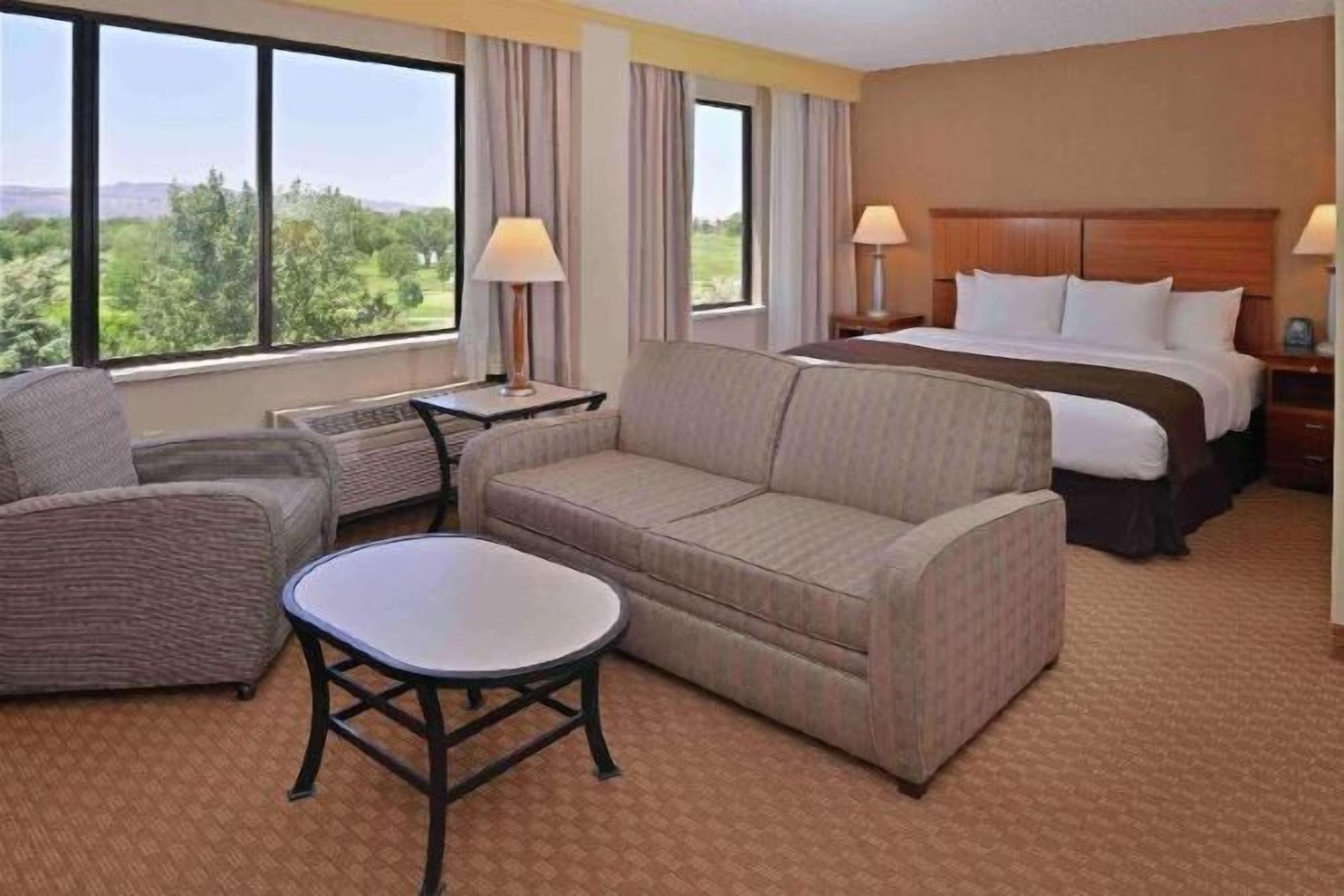 Hypo-allergenic bedding, down comforters, pillowtop beds, in-room safe