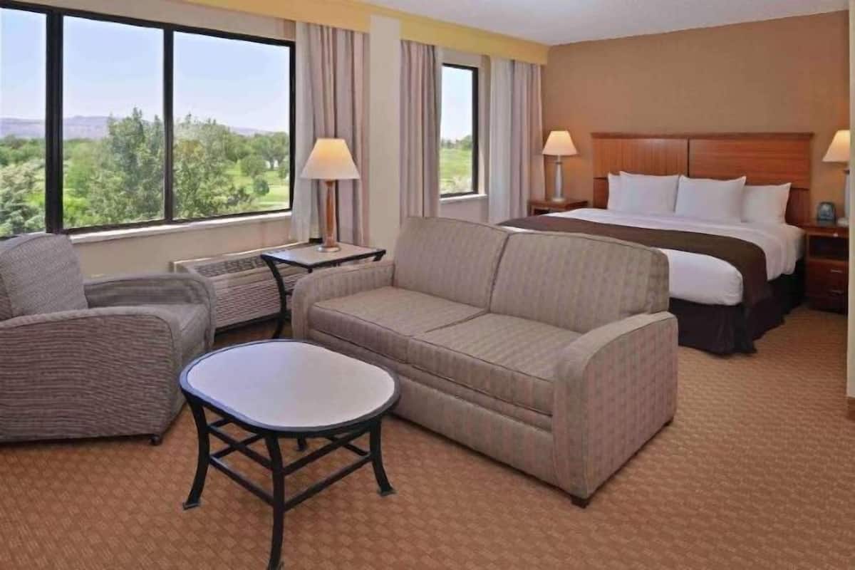 Hypo-allergenic bedding, down duvets, pillow-top beds, in-room safe