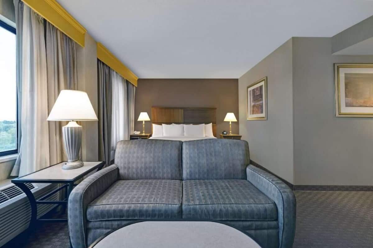 Hypo-allergenic bedding, down comforters, pillowtop beds, in-room safe