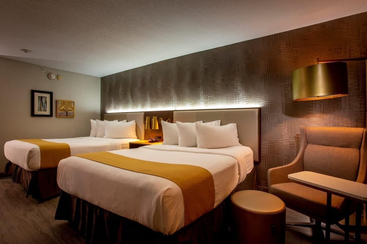 Premium bedding, Select Comfort beds, desk, blackout curtains