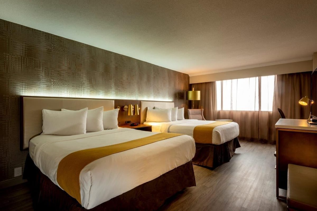 Premium bedding, Select Comfort beds, desk, blackout curtains