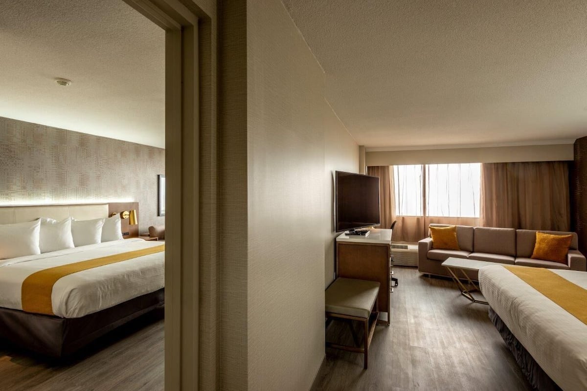 Premium bedding, Select Comfort beds, desk, blackout curtains