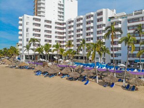 On the beach, free beach cabanas, sun-loungers, beach umbrellas