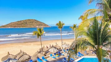 On the beach, free beach cabanas, sun loungers, beach umbrellas