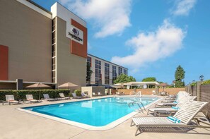 Outdoor pool, open 6:00 AM to 10:00 PM, pool umbrellas, pool loungers