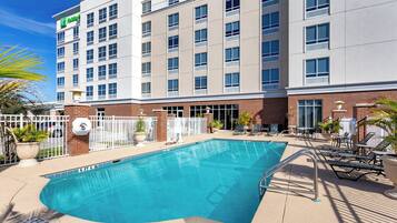 Outdoor pool, open 7:00 AM to 10:00 PM, sun loungers
