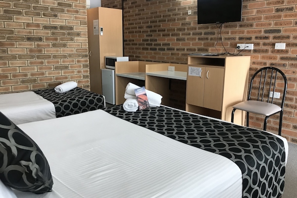 Standard Room, Non Smoking (Twin Share) | 1 bedroom, individually decorated, individually furnished, desk