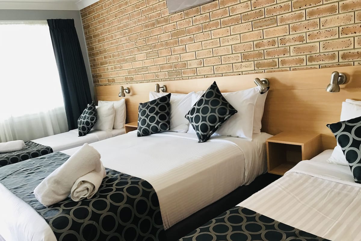 Family Room, Non Smoking | 1 bedroom, individually decorated, individually furnished, desk