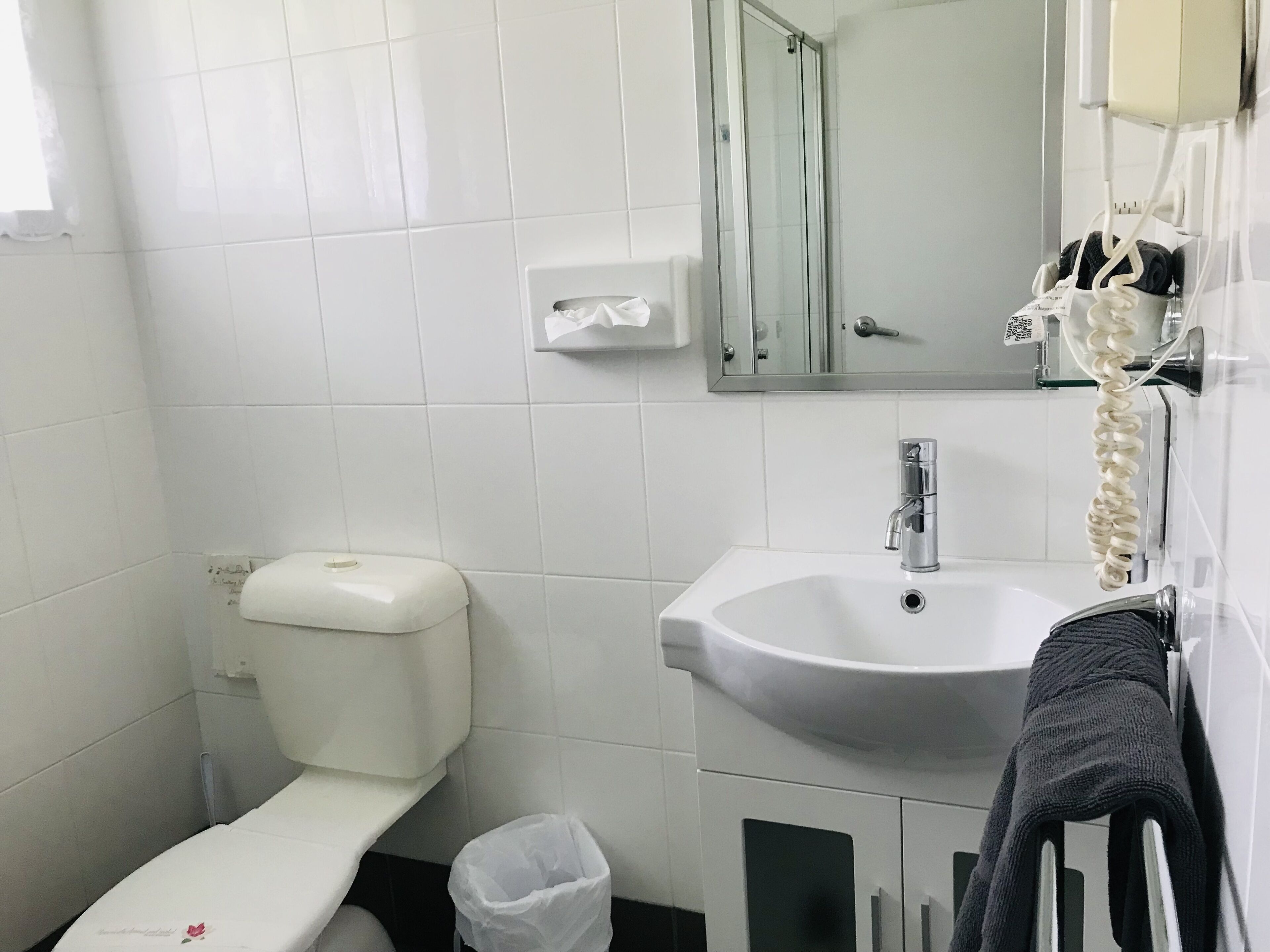 Shower, eco-friendly toiletries, hair dryer, towels