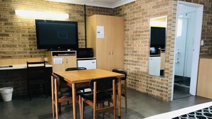 Family Suite, 1 Bedroom, Non Smoking, Kitchenette (Open plan family room) | Desk, laptop workspace, blackout drapes, soundproofing