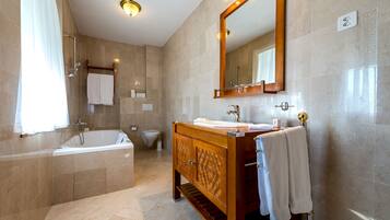 Bathtub, deep-soaking bathtub, eco-friendly toiletries, hair dryer