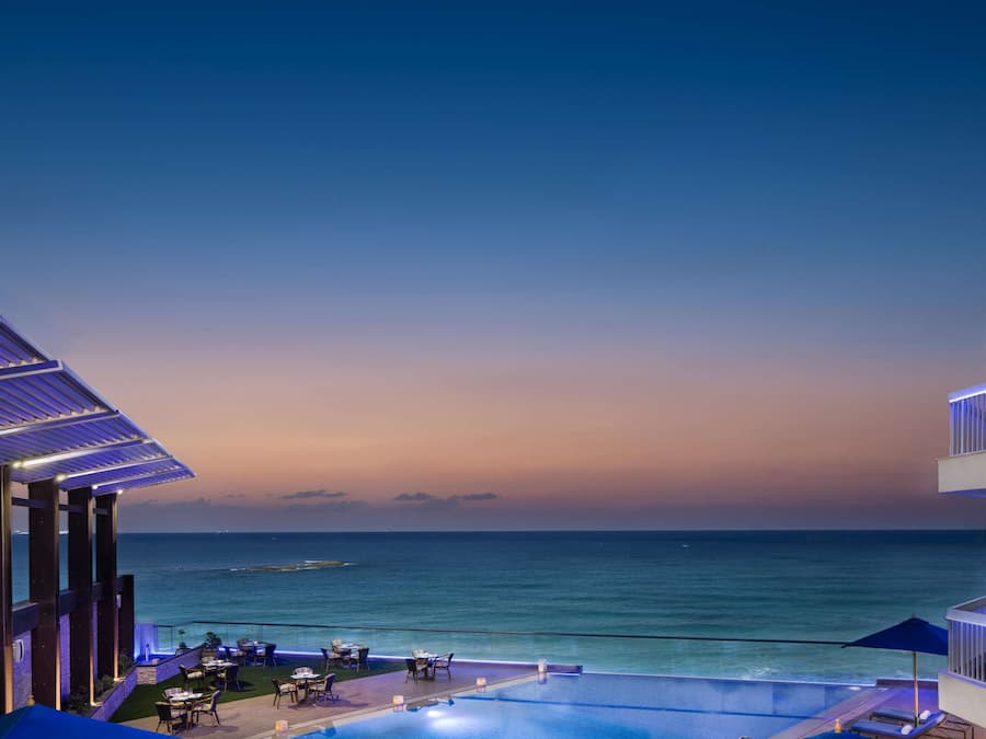 Outdoor pool, open 9:00 AM to 5:00 PM, pool umbrellas, sun loungers