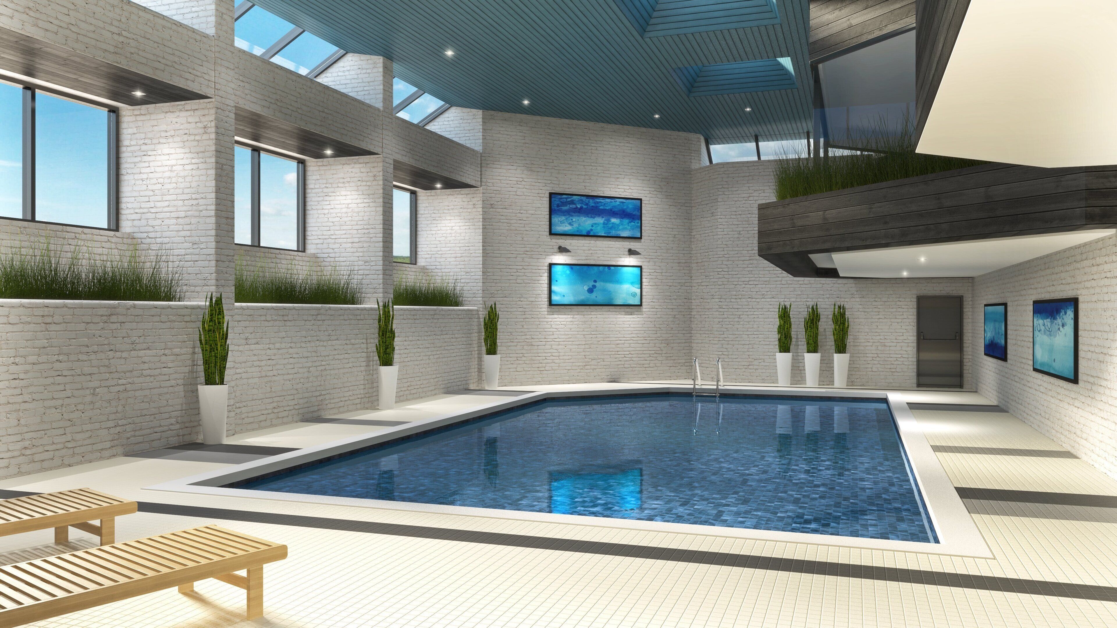 A modern indoor swimming pool with a brick wall, potted plants, and artwork.