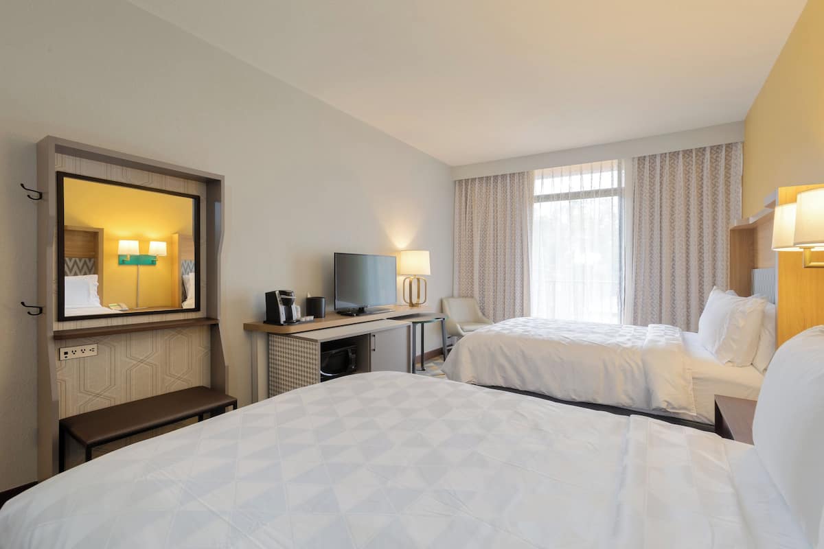 Standard Room, 2 Queen Beds, Microwave | Pillowtop beds, in-room safe, desk, blackout drapes