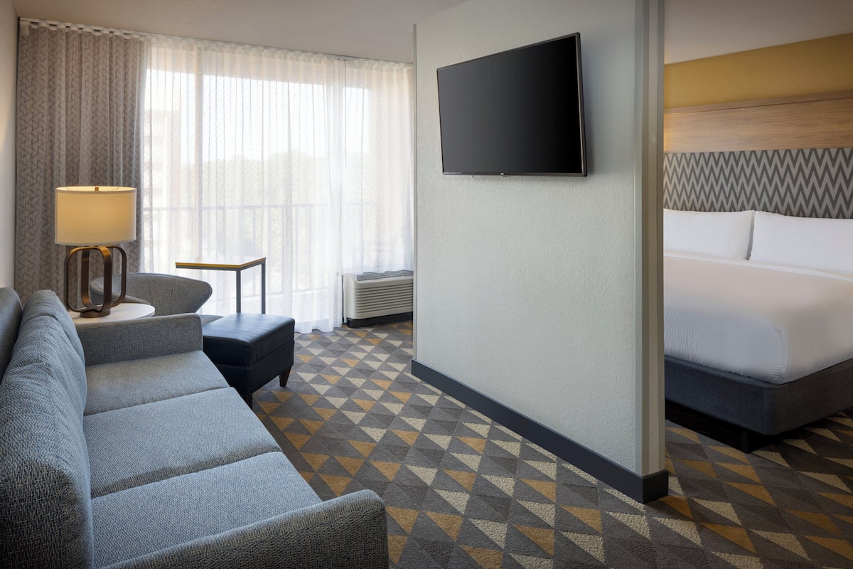 Suite, 1 King Bed with Sofa bed | Pillowtop beds, in-room safe, desk, blackout drapes