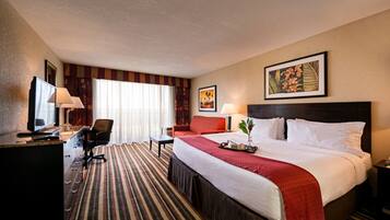 Colchones con pillow-top y caja de seguridad en la habitación