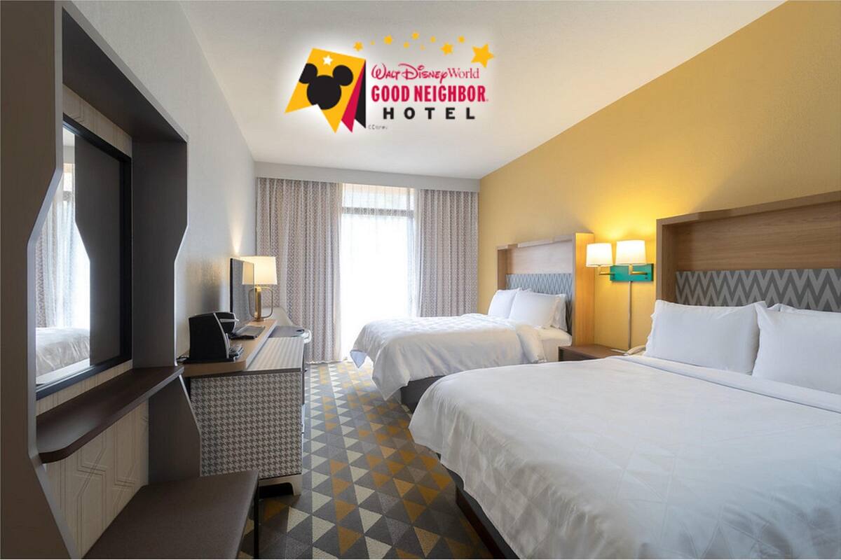 Standard Room, 2 Queen Beds, Microwave | Pillowtop beds, in-room safe, desk, blackout drapes