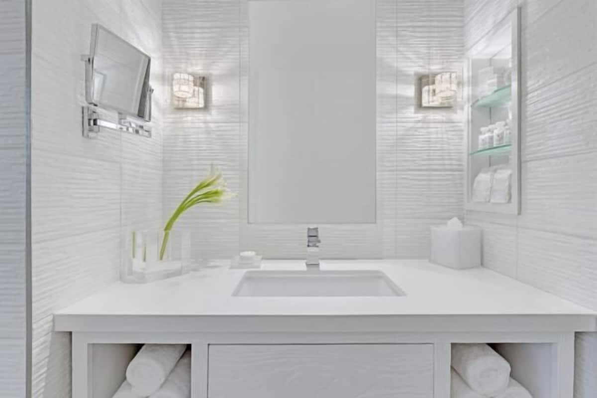 Designer toiletries, hair dryer, bathrobes, slippers