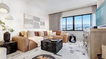 Malibu Suite | Living area | 60-inch LCD TV with digital channels, TV