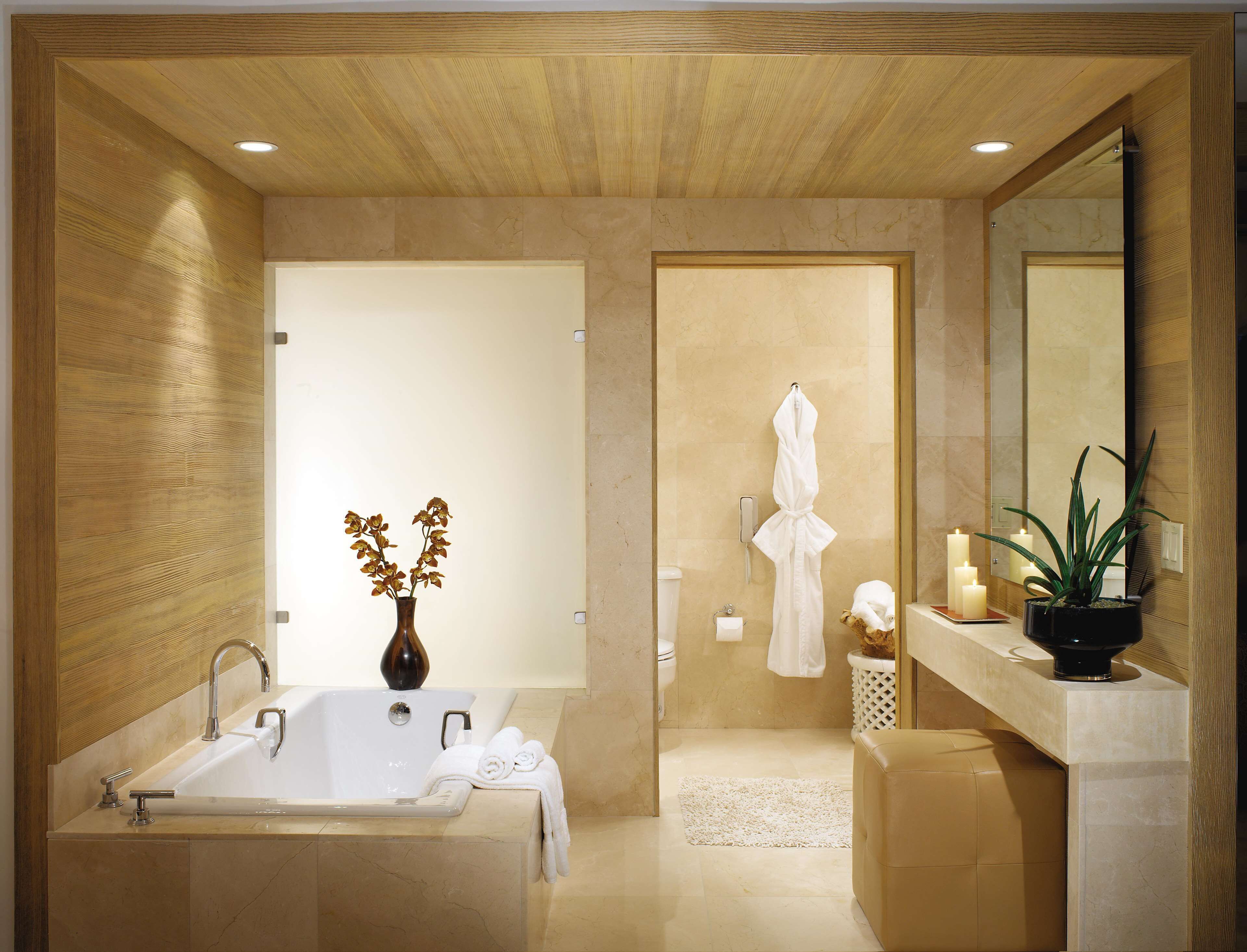 signature suite | bathroom | designer toiletries, hair dryer, bathrobes, slippers