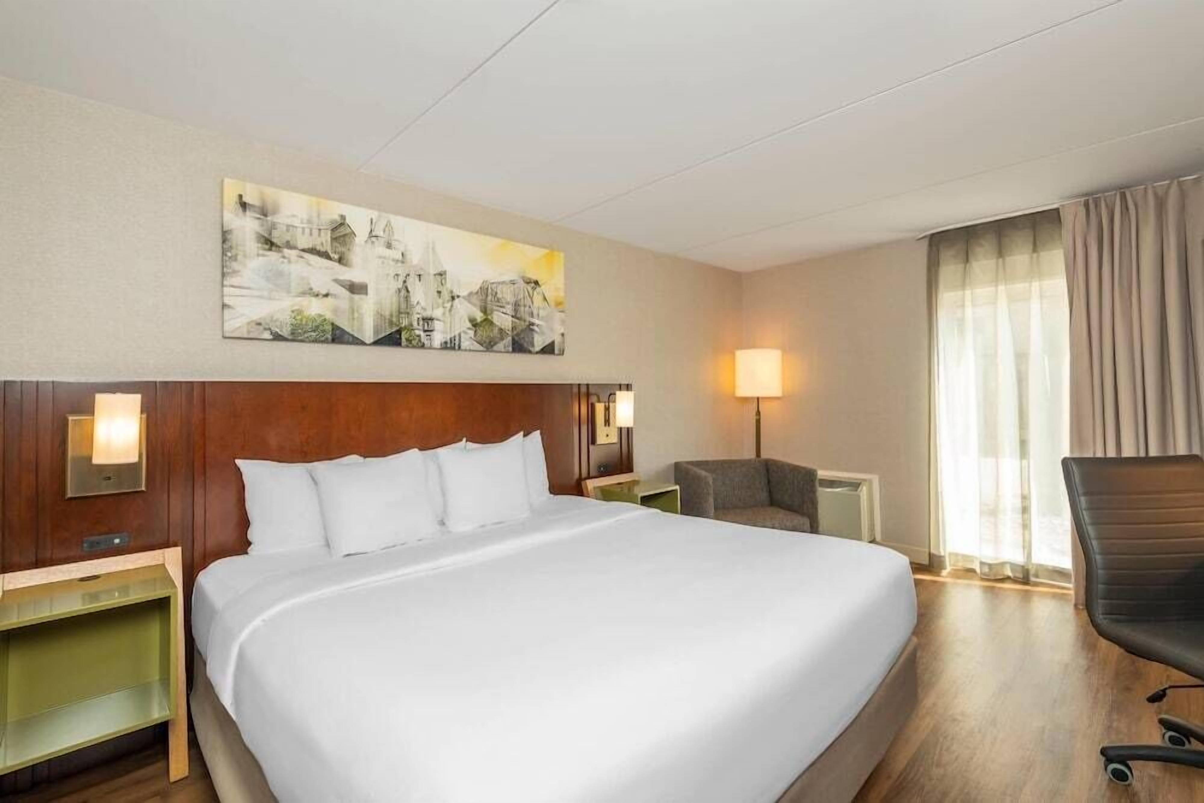 Premium bedding, pillowtop beds, desk, blackout drapes
