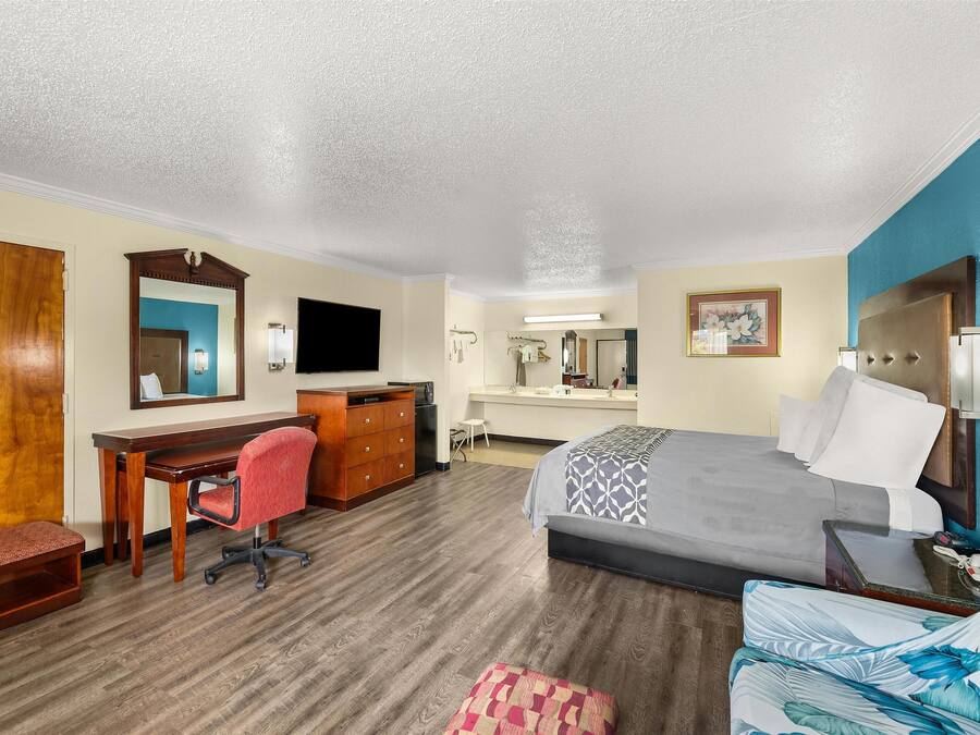 Desk, blackout curtains, iron/ironing board, cots/infant beds