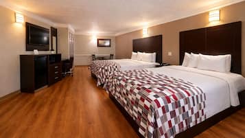 Desk, laptop workspace, blackout drapes, iron/ironing board