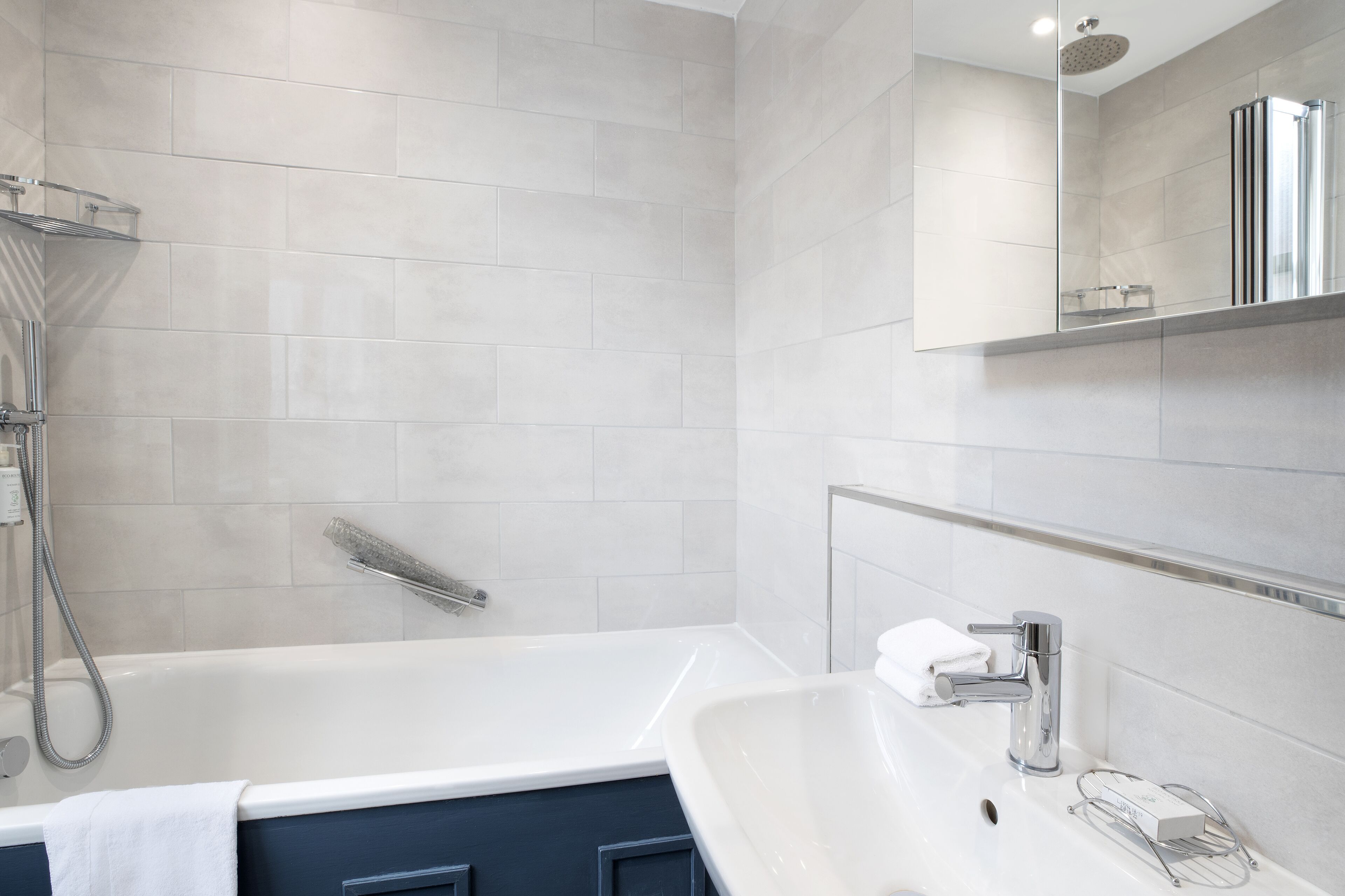 shower, eco-friendly toiletries, hair dryer, towels