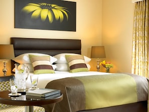 Egyptian cotton sheets, down duvets, pillow-top beds, in-room safe