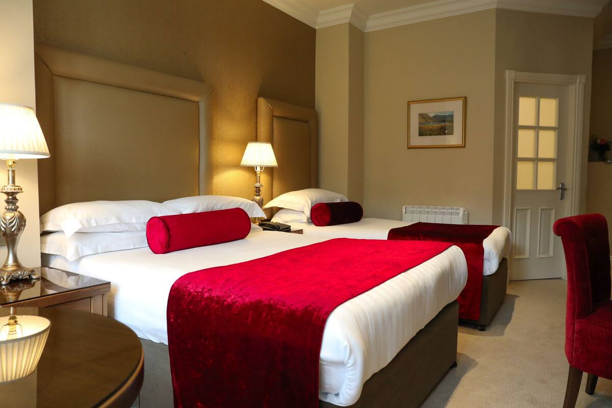 Triple Room | Egyptian cotton sheets, down comforters, pillowtop beds, in-room safe