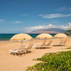 On the beach, sun loungers, beach umbrellas, scuba diving