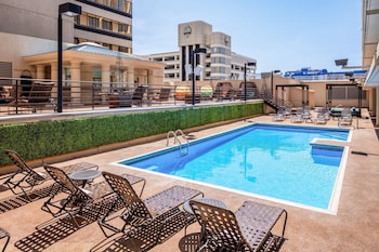 Seasonal outdoor pool, open 9:00 AM to 7:00 PM, sun loungers at Eldorado Resort Casino at THE ROW