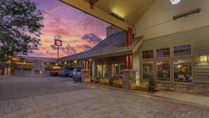 A hotel with a stone facade, large windows, and a sign indicating it is a Best Western property. - Best Western Plus High Country Inn (Ogden)