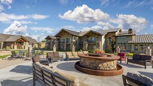 A courtyard with outdoor seating, a fire pit, and a pool area. - Best Western Plus High Country Inn (Ogden)