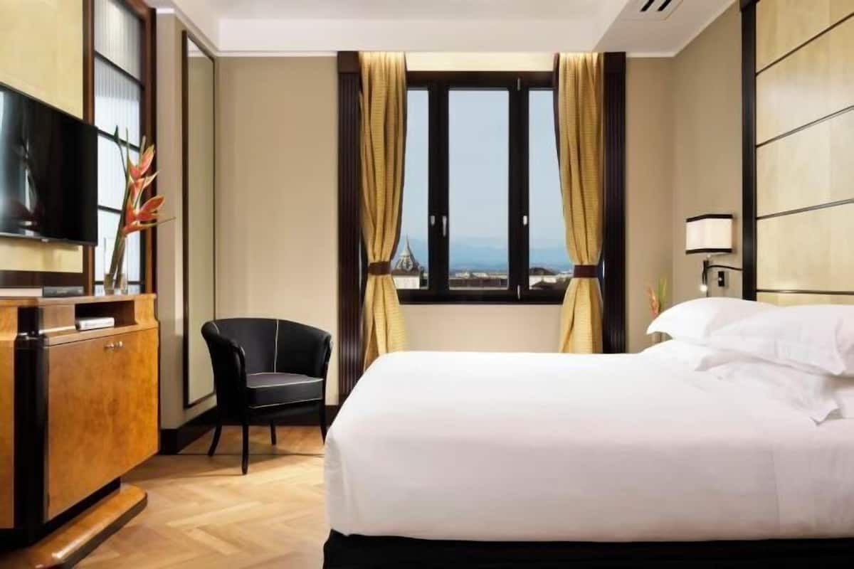 1 habitación, ropa de cama hipoalergénica y minibar