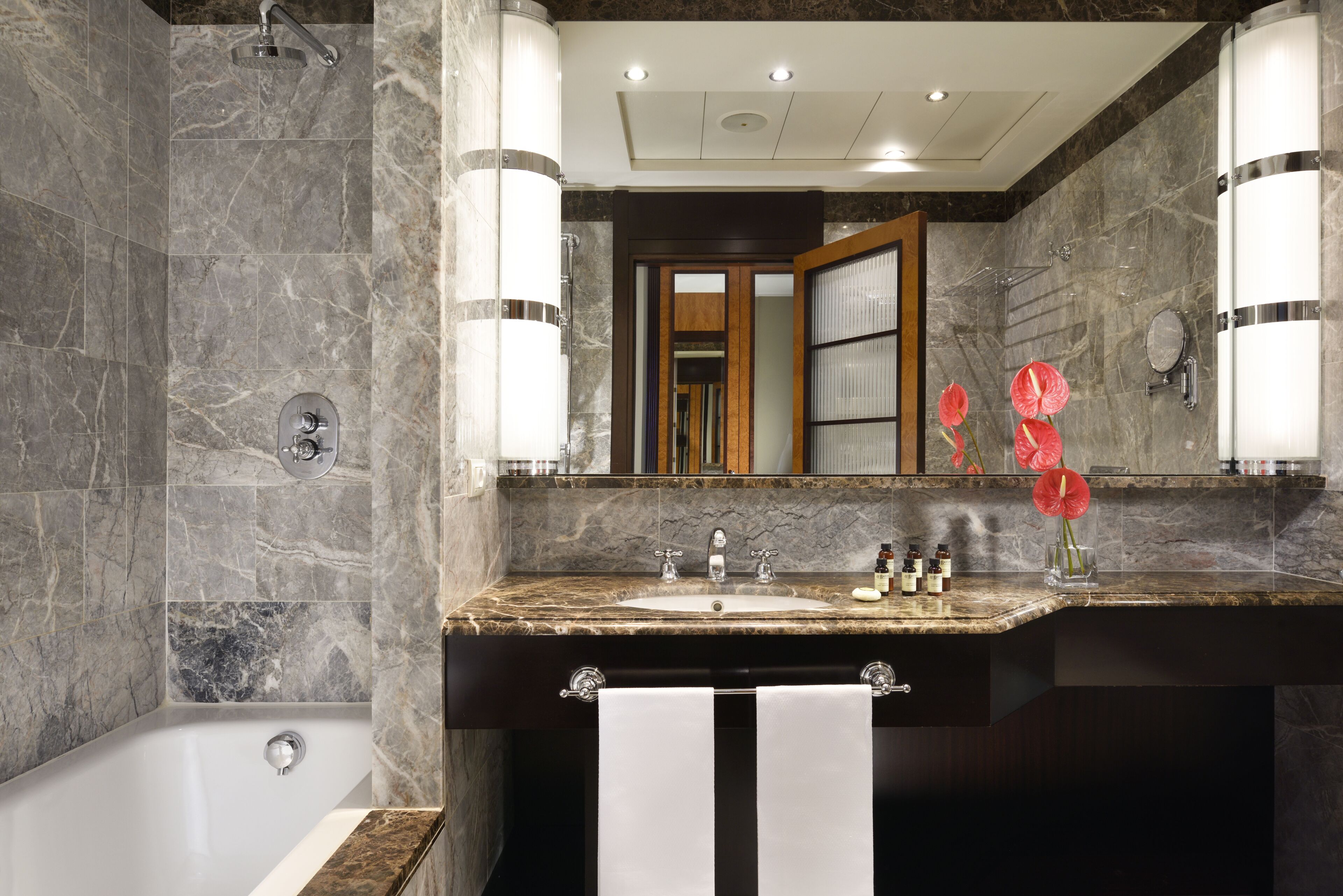 hair dryer, bathrobes, bidet, towels