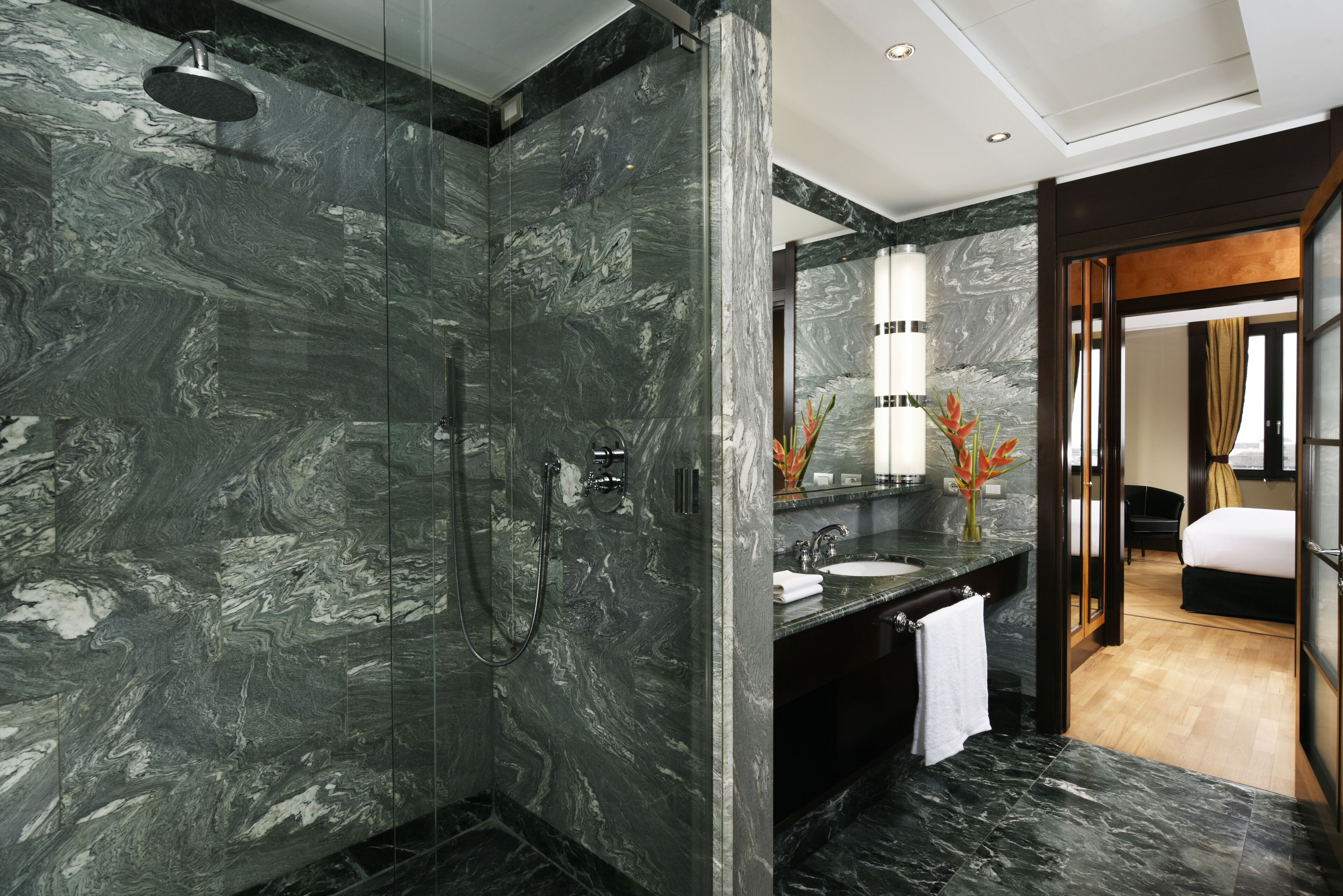 hair dryer, bathrobes, bidet, towels