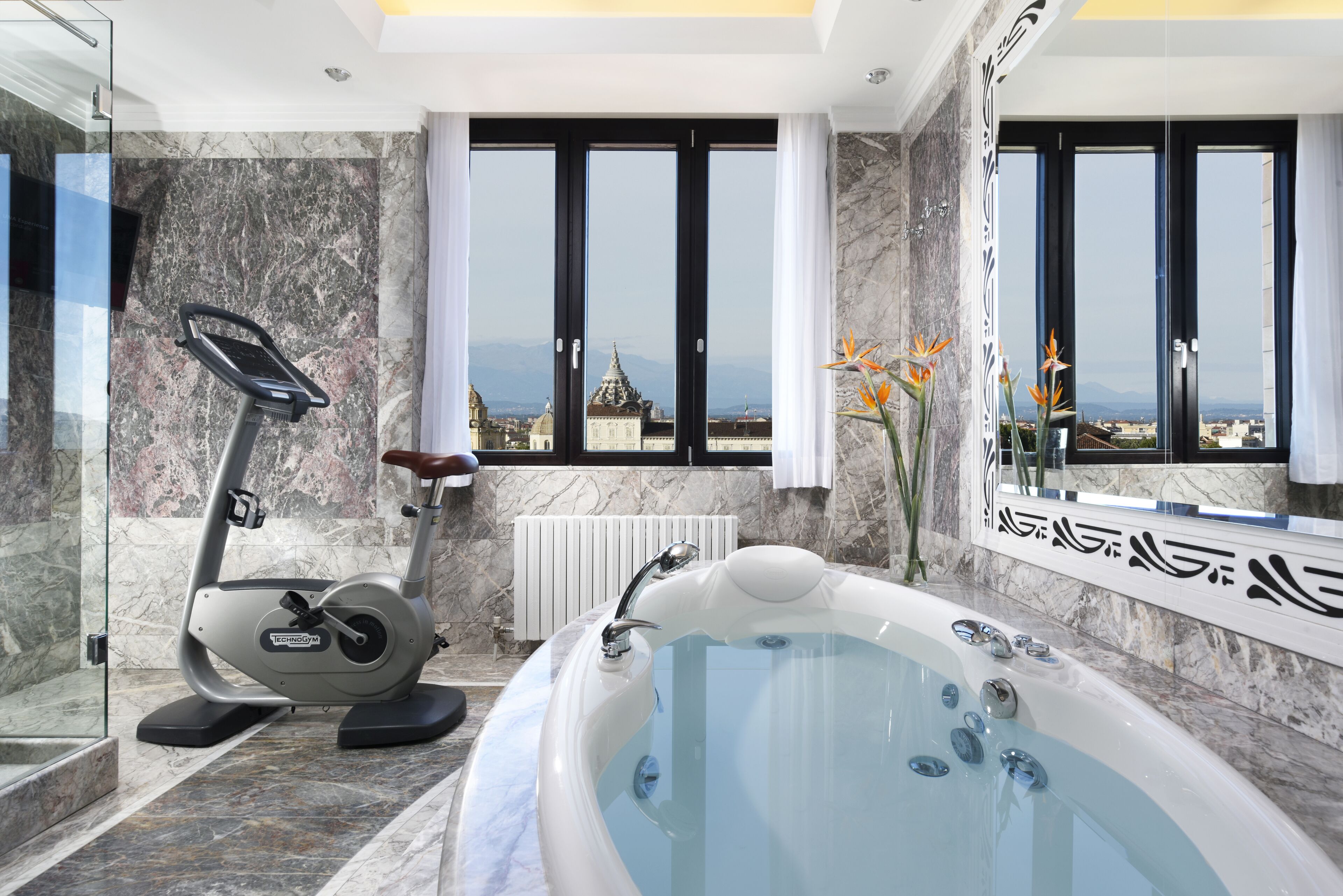 hair dryer, bathrobes, bidet, towels