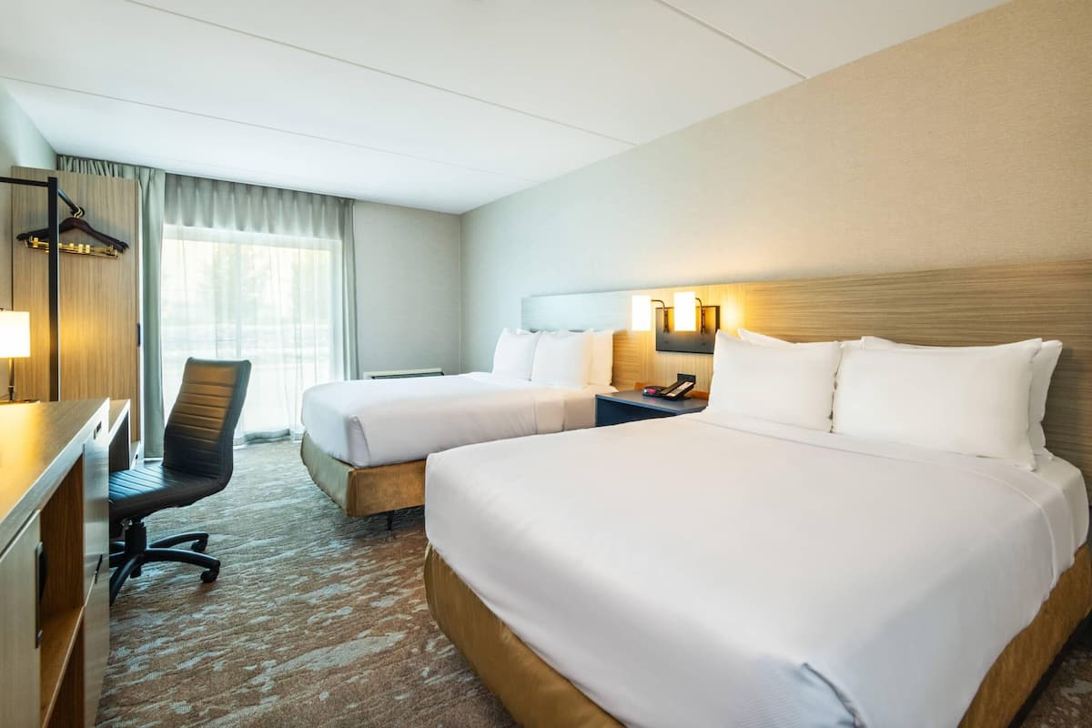 Standard Room, 2 Double Beds, Non Smoking, Ground Floor | Desk, blackout drapes, iron/ironing board, free WiFi