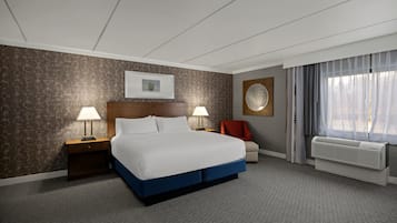 Suite, 1 King Bed, Non Smoking | Premium bedding, down duvets, pillow-top beds, in-room safe