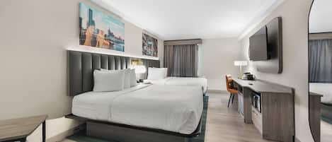 Habitación Deluxe, 2 camas Queen size, para no fumadores | Escritorio, insonorización y tabla de planchar con plancha